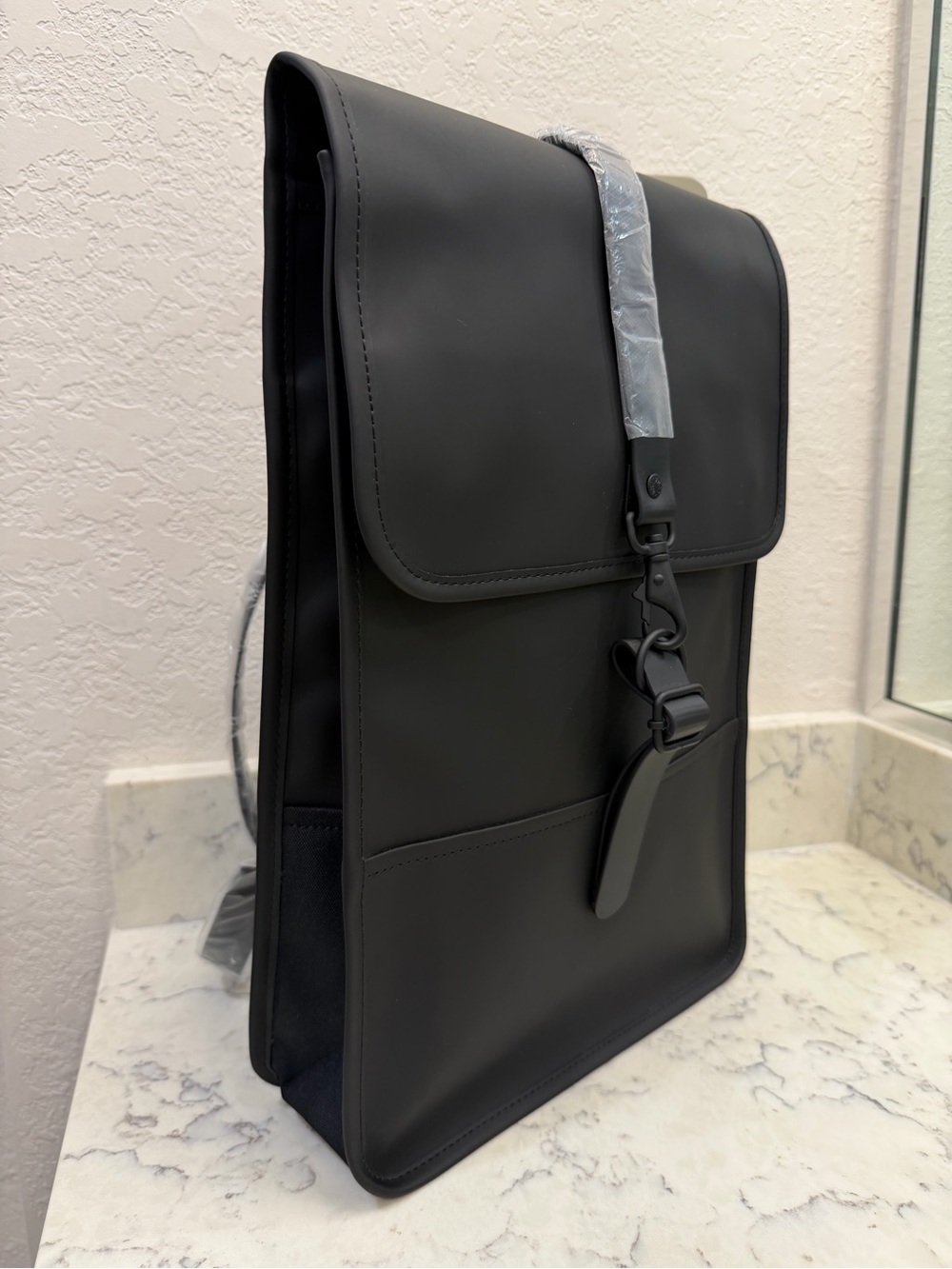 Rains Black Backpack